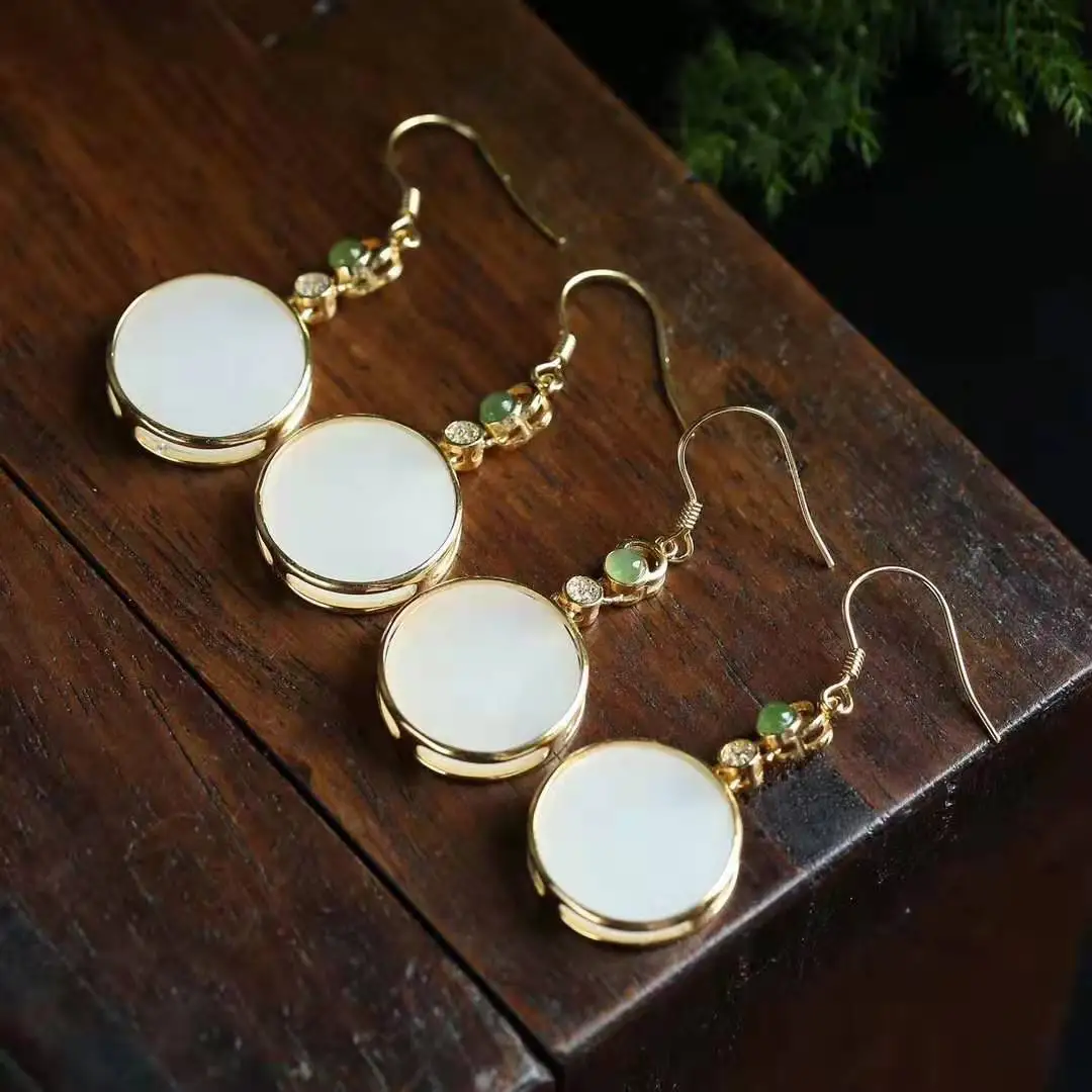 

Natural Hetian white jade round plate Chinese style retro bohemian designer craft charm women's silver jewelry