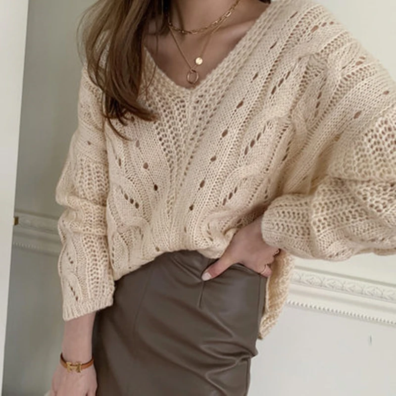 

Qiu dong languid is lazy wind restoring ancient ways big v-neck head set loose hemp pattern is hollow-out sweater