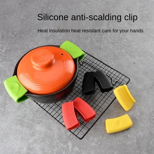 2pcs convenience silicone creative cast iron pot handle insulation hand clip earmuffs kitchen accessories gadgets sets free global shipping