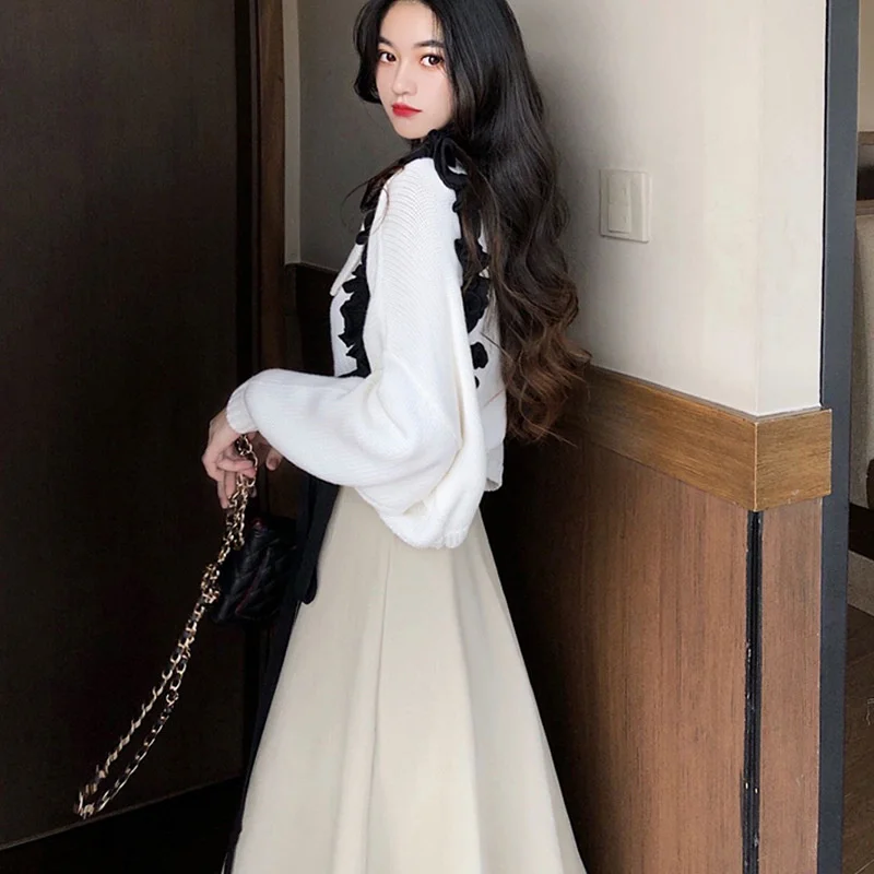 

2021 New Fashion Suit Women's Korean-style Long-sleeved Top Suspender Skirt Two-piece Suit Factory Direct SupplyRachel