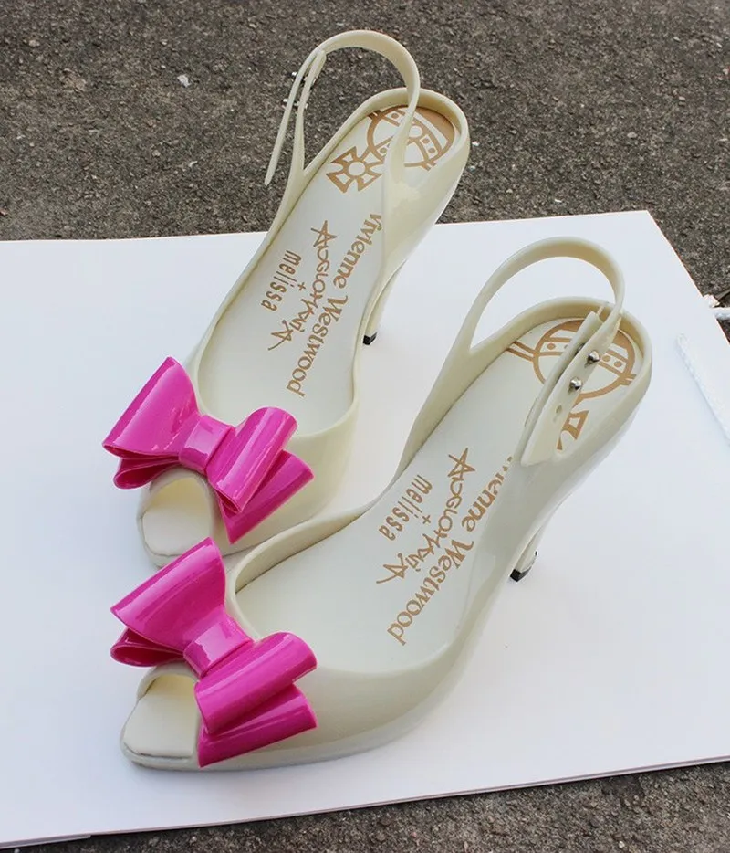 Женские туфли лодочки на высоком каблуке с открытым носком и украшением в виде