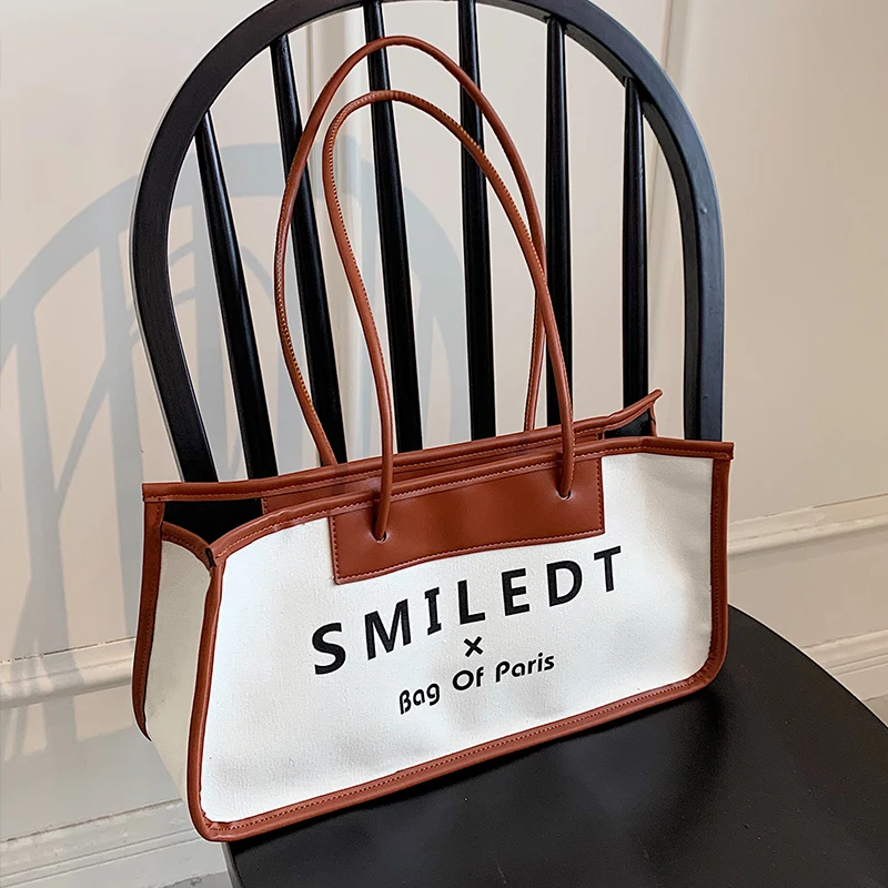 

2021 Summer Fashion Quality Texture Unique Niche Designer Canvas Letter Printing Brand Luxury Women Shoulder Armpit Handbag