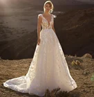 Роскошные свадебные платья 2021 трапециевидной формы из прозрачной ткани Перья Кружева Аппликации с открытой спиной развертки поезд невесты Vestidos De Noiva