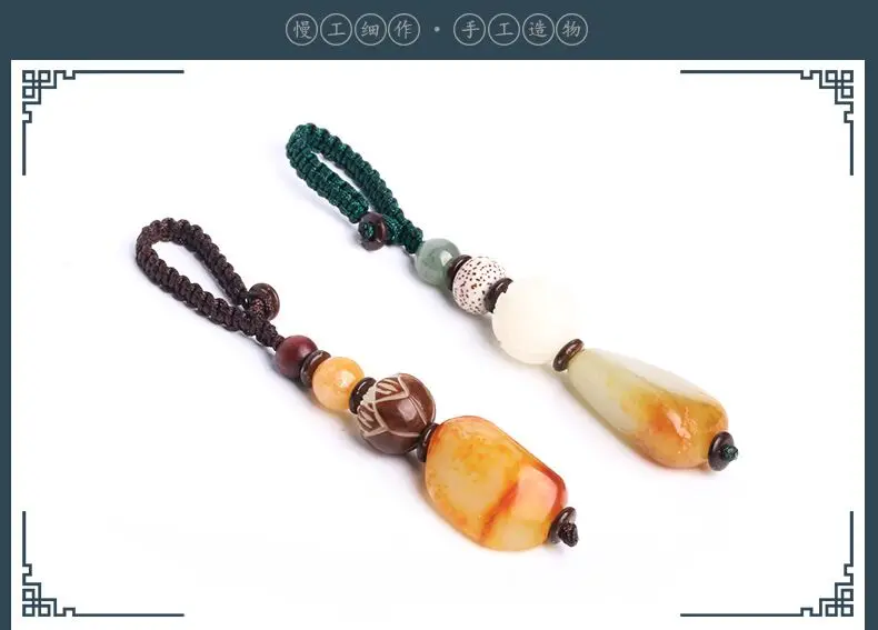 

Original natural hetian jade seed material with red qinpi raw stone key chain high-end car lovers Lady pendant key chain 2020