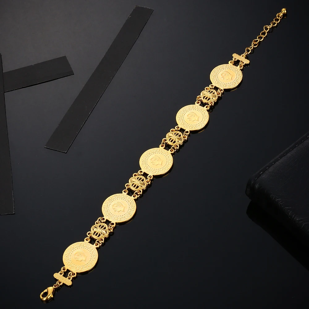 Женский и мужской браслет украшенный драгоценными Монетами Золотого Цвета с