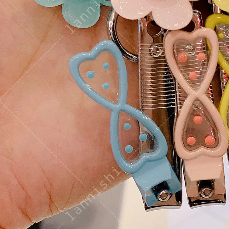 

Creative Korean nail clipper key chain wholesale oil nail buckle women's favorite gift