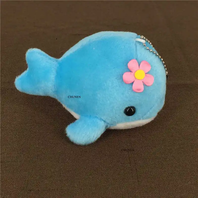 

Multi-color, dolphin toy, large eight inches aprox. Ocean animal keychain stuffed animal