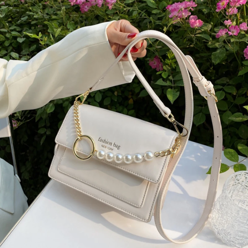 

Luxury Pearl Crossbody Bag for Women 2021 Solid Color Chain Shoulder Handbags Lady Shoulder Handbags Travel Bag