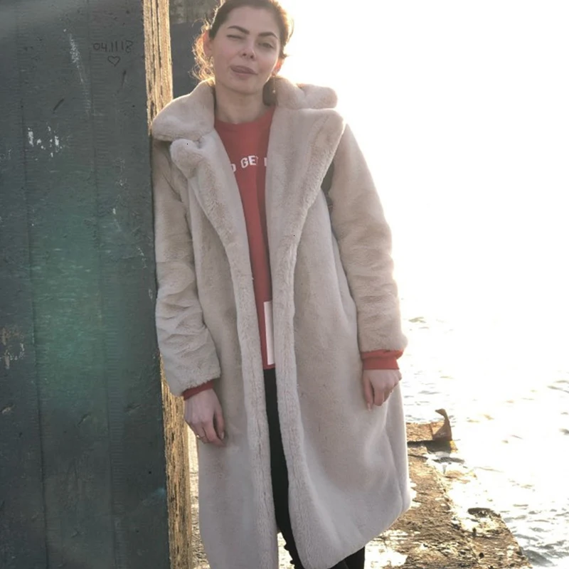 Осенне зимнее пальто пушистое теплое женское с длинным рукавом Меховая куртка