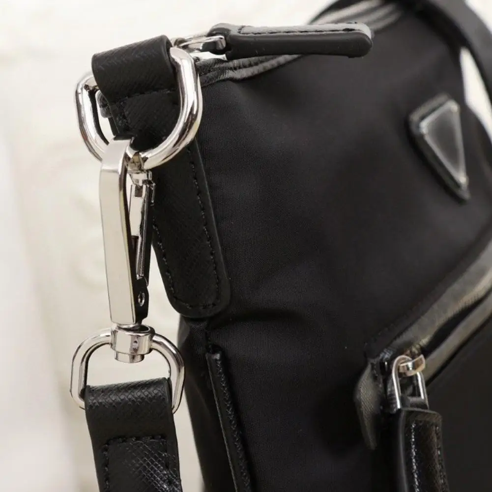 

2021 Unisex black nylon canvas waterproof one-shoulder messenger bag multifunctional portable simple casual bag