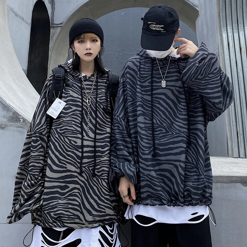 

2021 fashionistas retro men's and women's sweater loose ins trend zebra pattern top coat hedging hooded shoulders