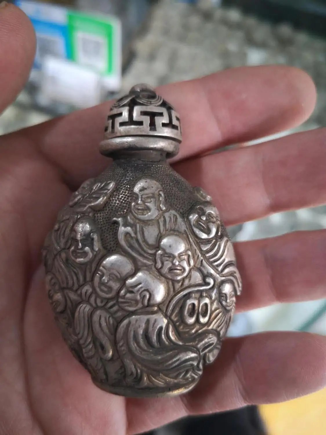 

Eighteen arhat white copper snuff bottle