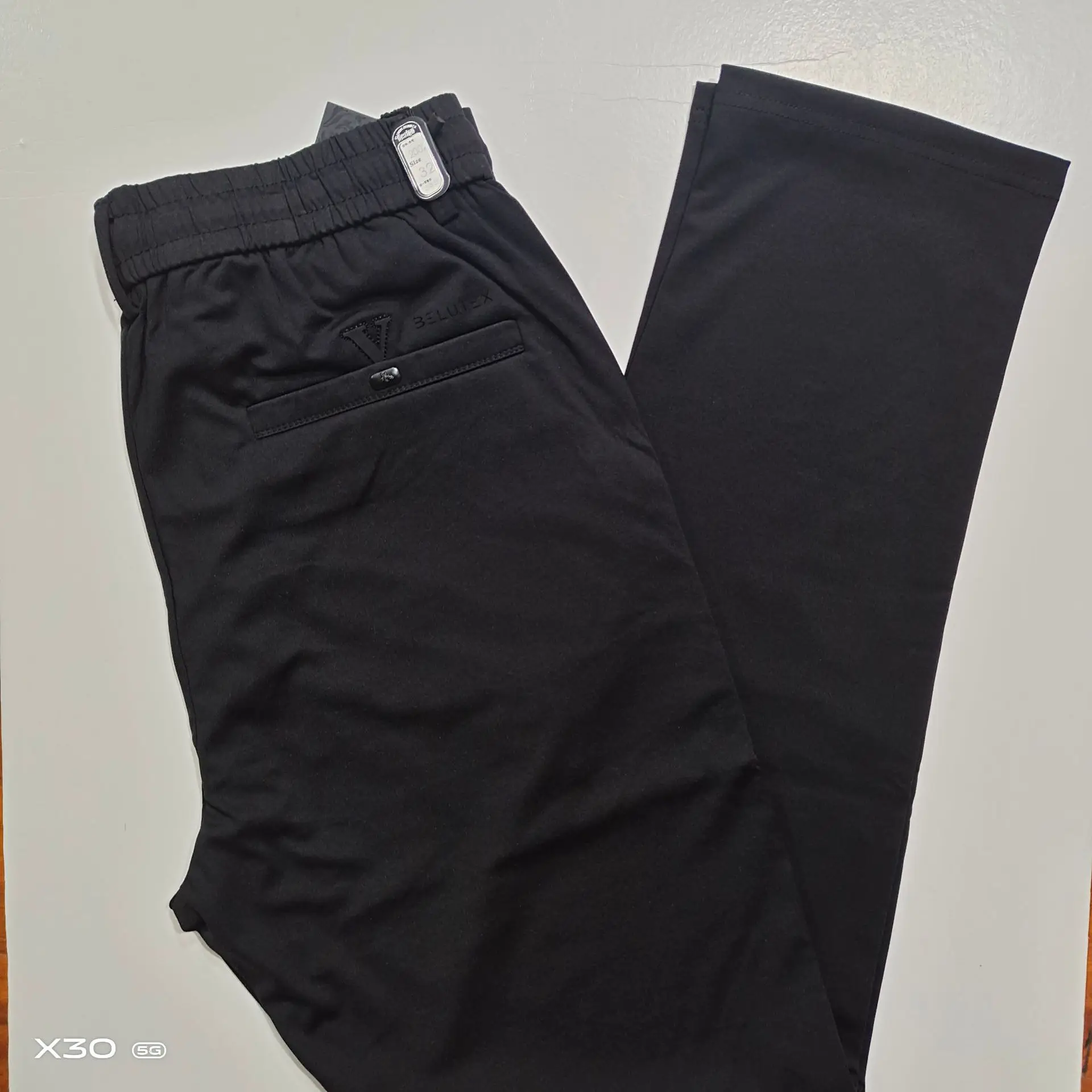 

Table cutting casual fashion plain tight waist men's casual pants