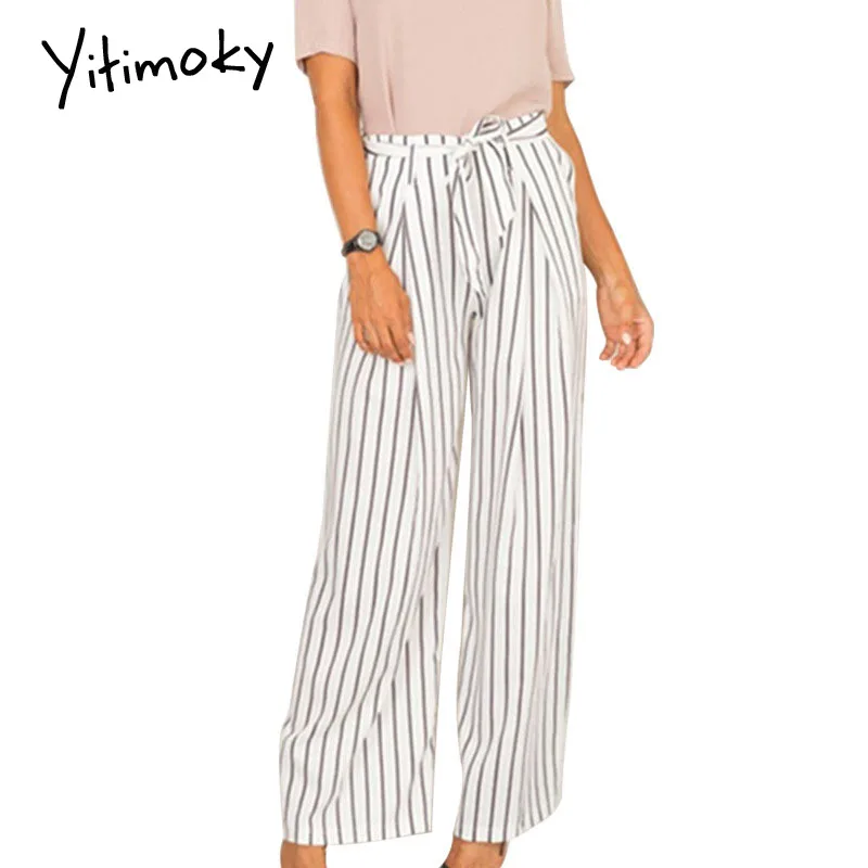 Весенние женские штаны с завязками на молнии черные полосатые белые высокой