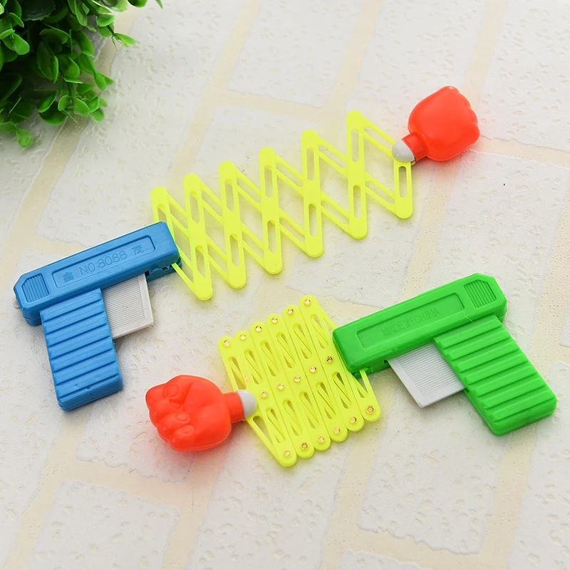 

Retractable Fist Shooter Trick Toy Gun Funny Child Kids plastic Party Festival Gift For fun Classic Elastic Telescopic Fist Toy