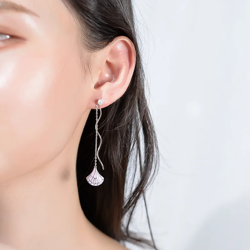 Морская раковина ветер и солнце красивое романтическое чистое серебро маленькая