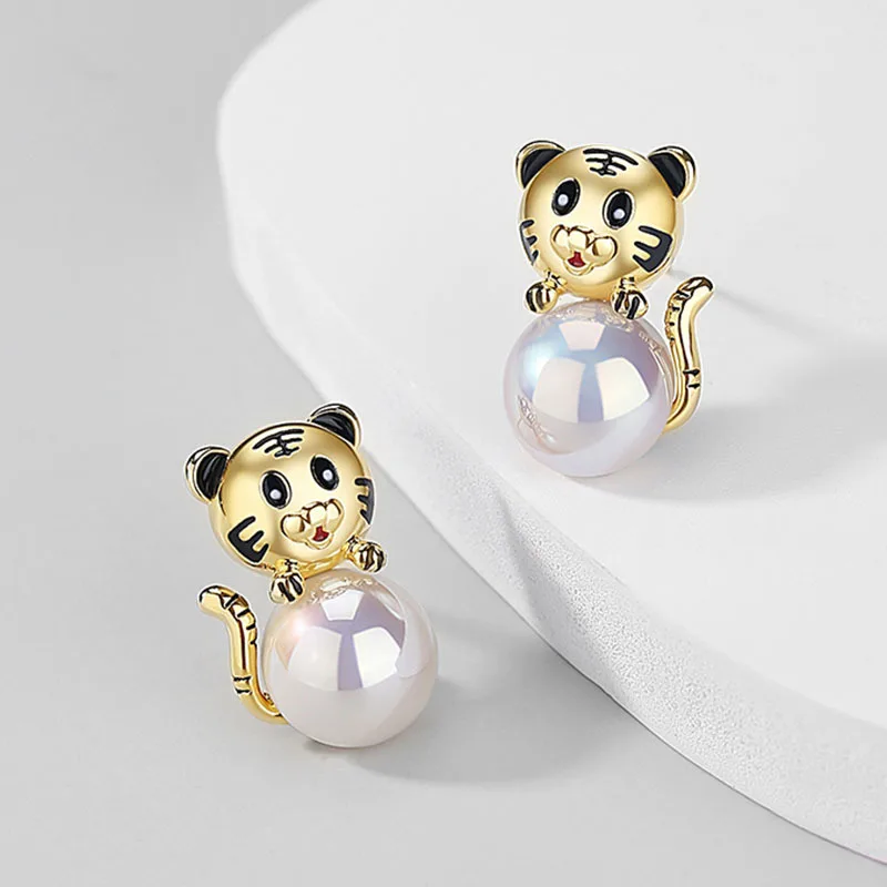 

S925 Silver needle cute tiger pearl ear stud This year zodiac baby tiger cute earrings female personality earpiece