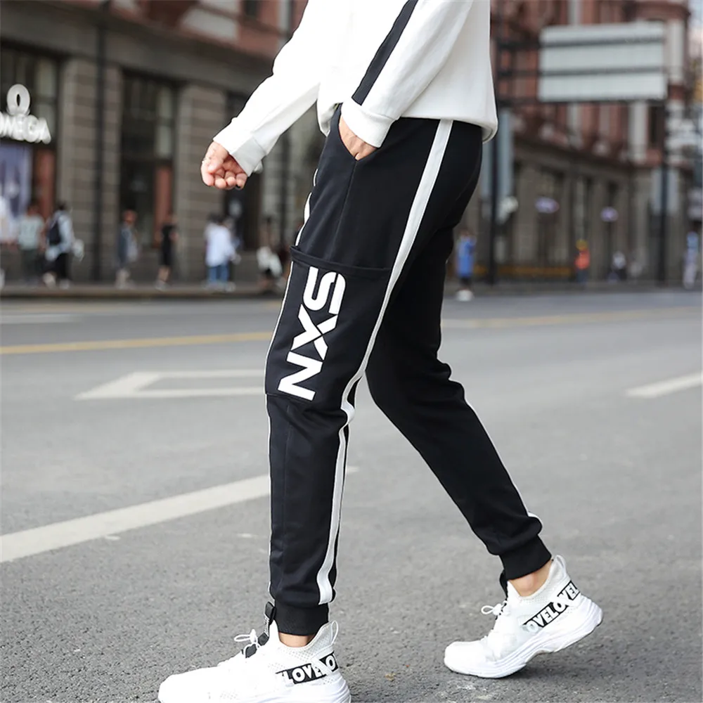 Мужские эластичные спортивные свободные брюки WWKK с боковыми карманами шаровары