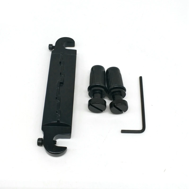 

Electric Guitar Bridge All-In-One Bridge Tailpiece Guitar Roller Saddle Bridge,for LP Electric Guitar