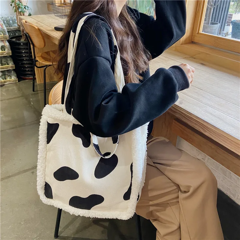 

Art retro large-capacity girl shoulder bag new rose plush stitching bag