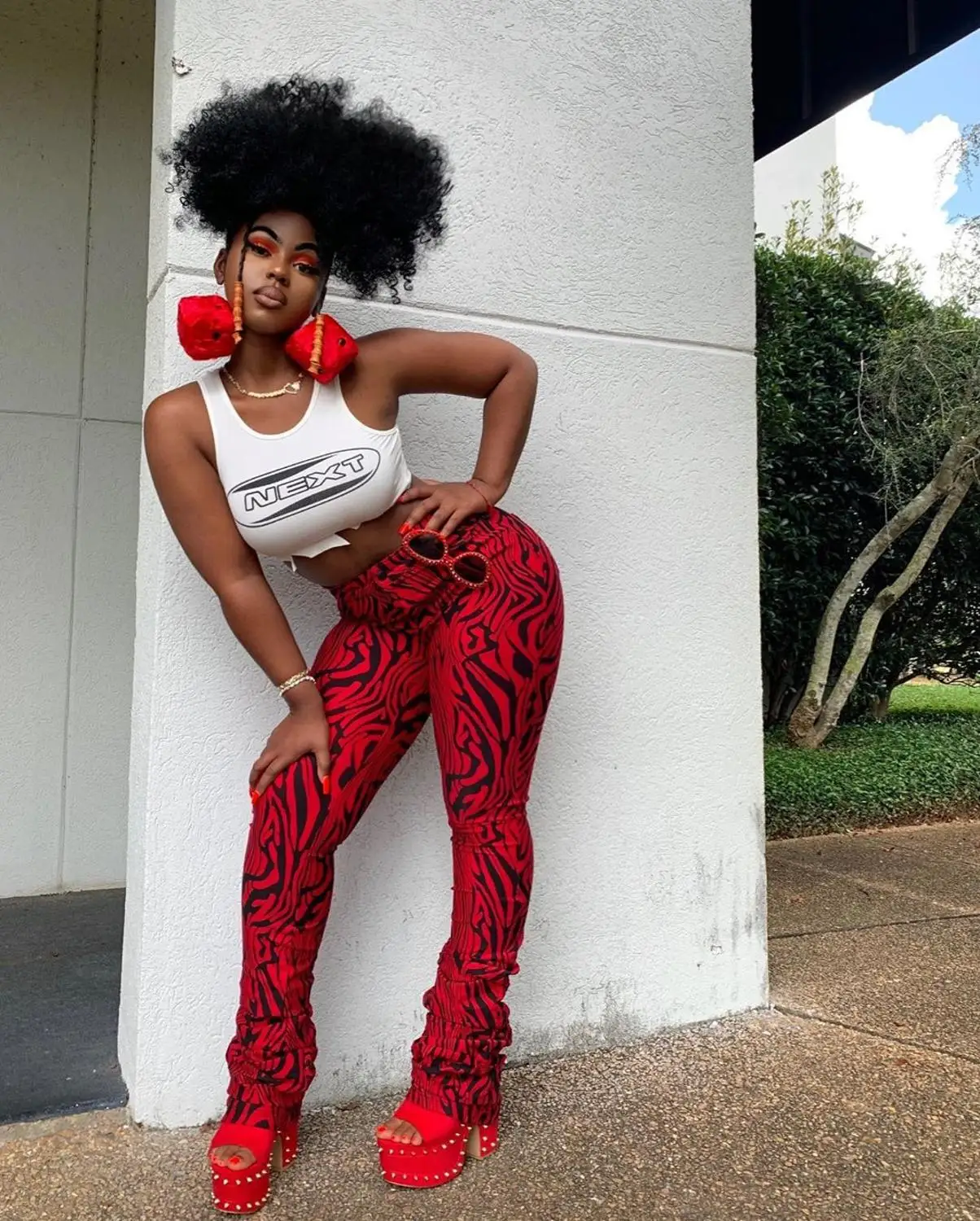 Брюки женские повседневные облегающие с принтом зебры красные расклешенные |