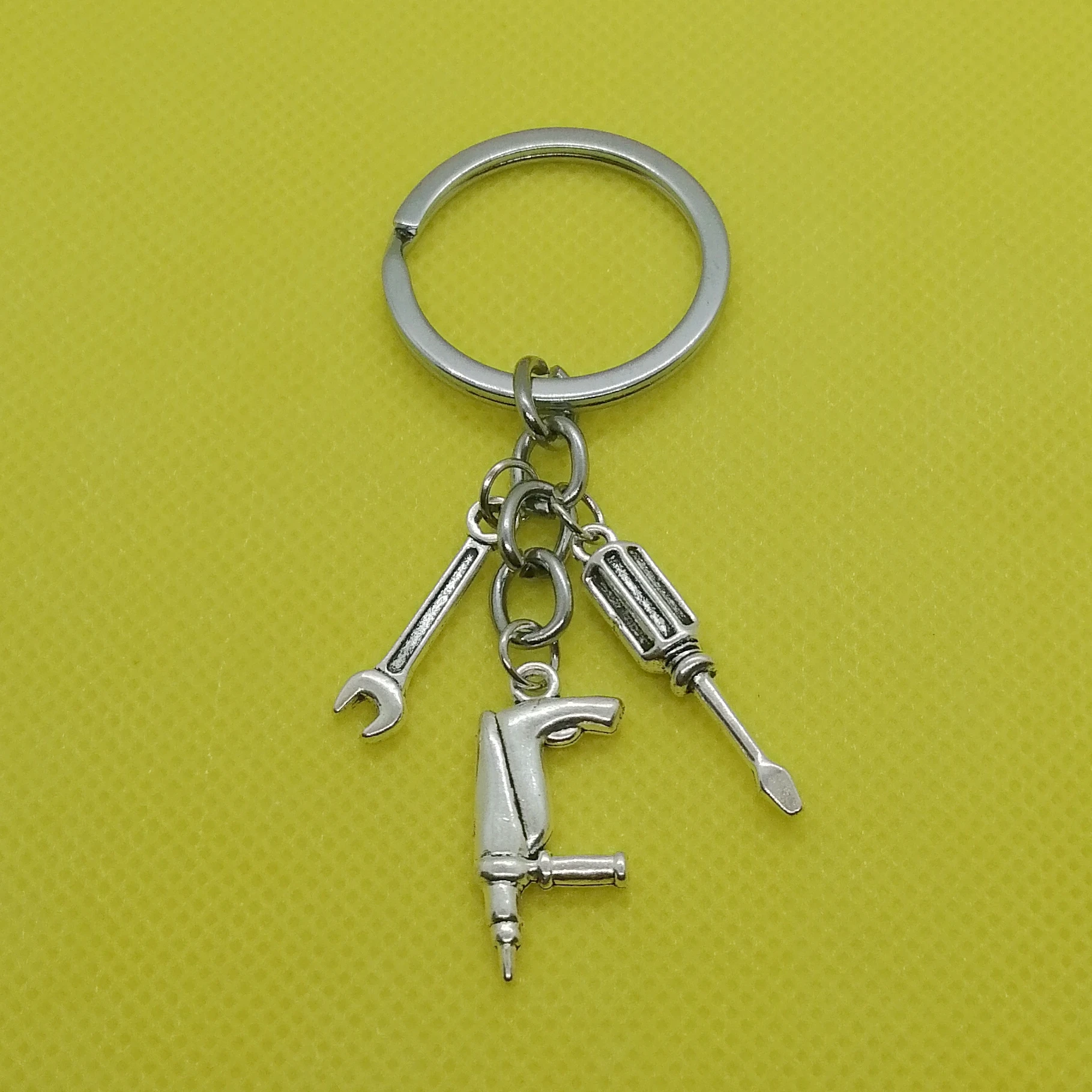 

Impact drill keychain exquisite tool keychain home improvement worker gift metal keychain fashion car key bag gift