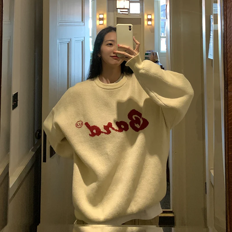 

Женский жаккардовый свитер свободного покроя с надписью