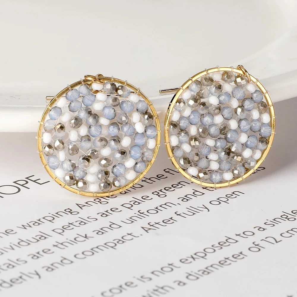 

Stainless steel earrings with high-grade rice beads braided by hand beaded earrings handmade beaded