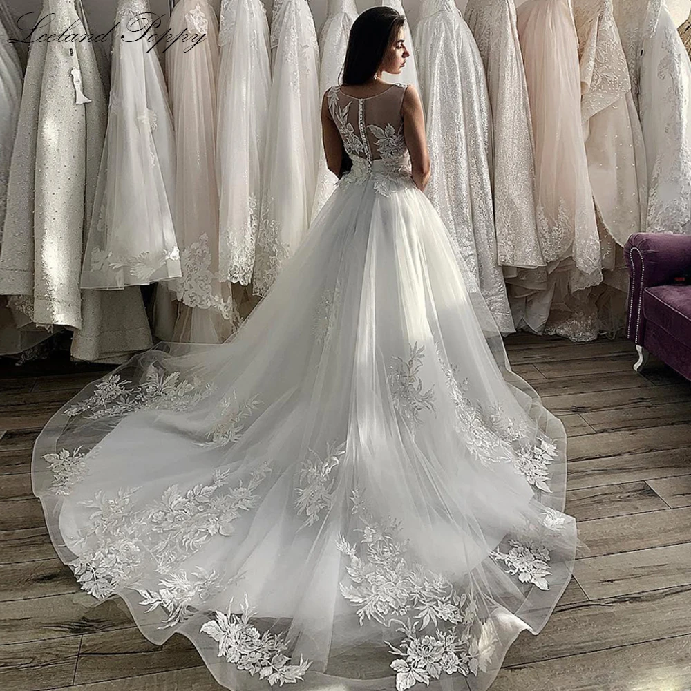 

Lceland Poppy A-line Tulle Wedding Dresses Scoop Neck Floor Length Bridal Gowns Sleeveless Lace Appliques Vestido de Noiva