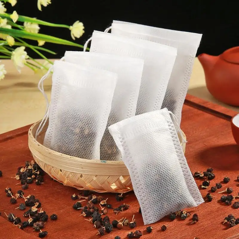 50/100pcs пустая Ароматические Чай сумки Нетканый шнурок для заварки травы свободные Кофе фильтрующим мешком инструменты Дома небольшие мешки для хранения
