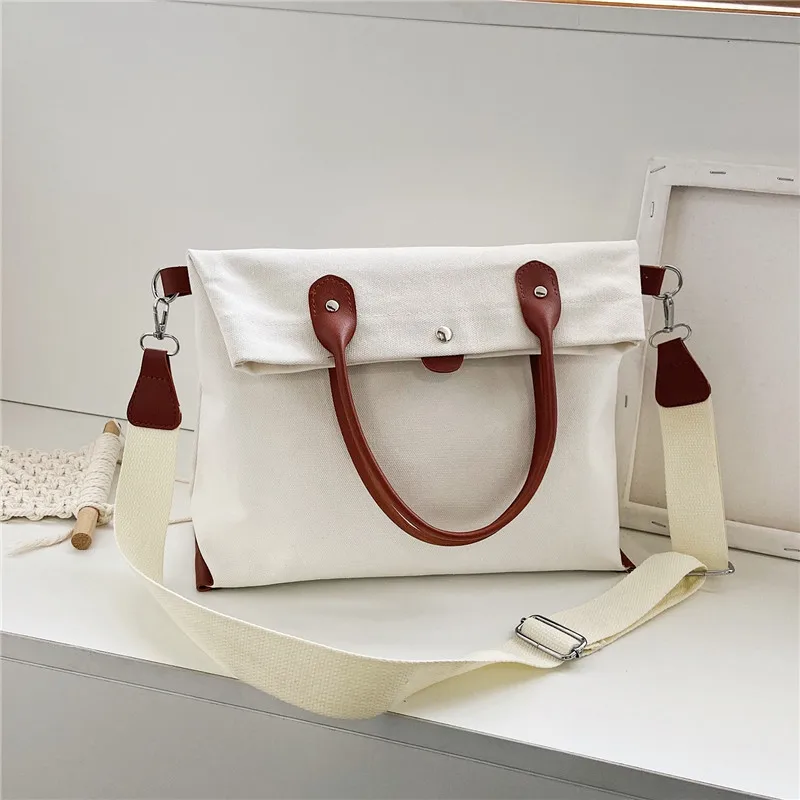 

2021 New fashion casual bucket canvas shoulder bag slanting across women's outdoor sports women's bag