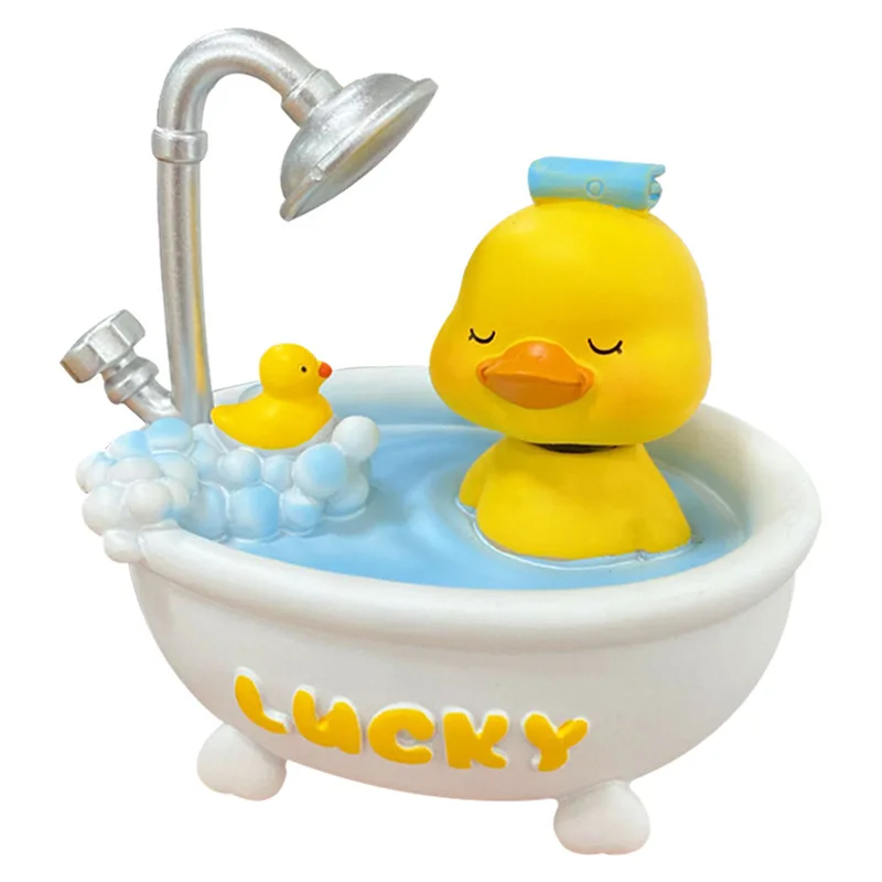 

Lovely Happiness Soap Bath Car Ornaments Key Chains Shaking Head Duck Doll Car Ornaments Home Office Table Decoration 2021
