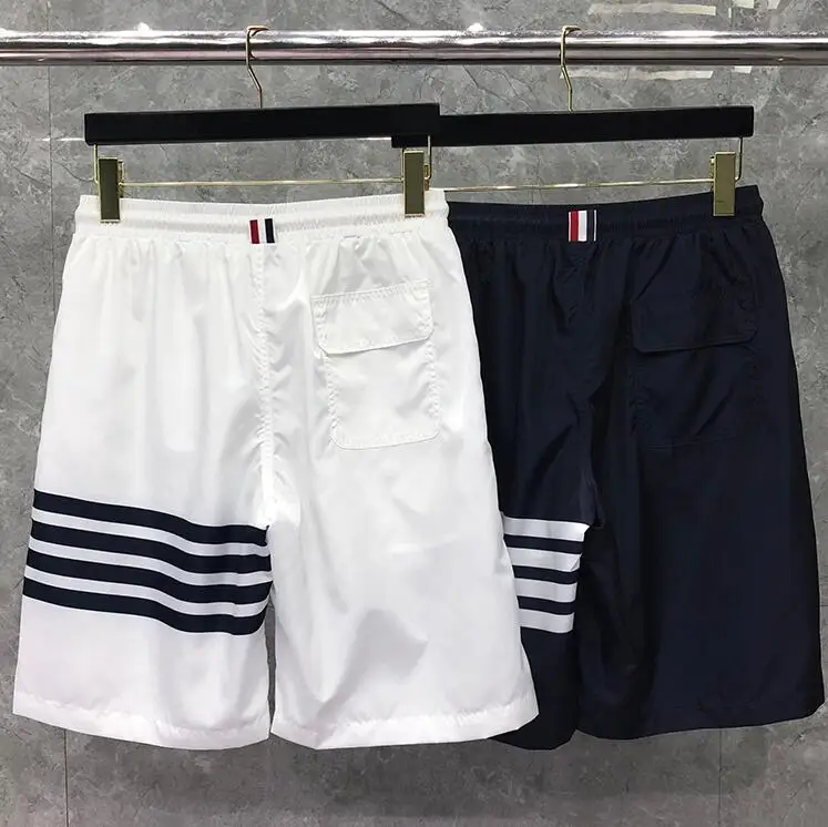 

TB 2021 Fashion THOM Brand Casual Shorts Men Summer Loose Beach Shorts Thin Quick Dry Football Pattern Blue Sport Shorts Ins