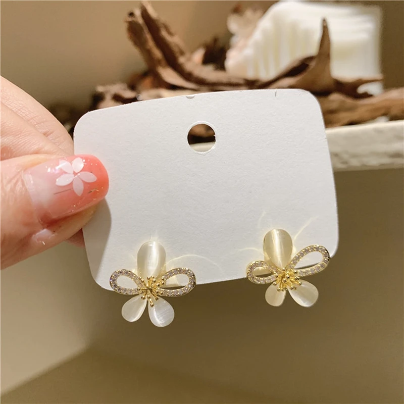 

MENGJIQIAO Korean Delicate Cute Opal Flower Stud Earrings For Women Ladies Elegant Micro Pave Zircon Bowknot Brincos Jewelry