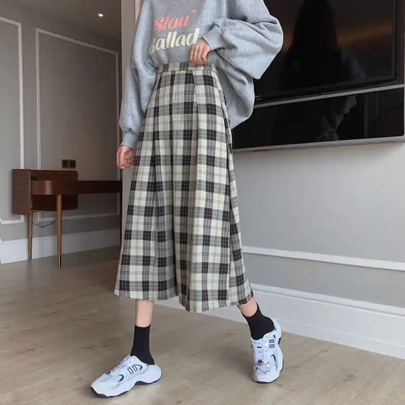 

2021 spring students' new Korean version of plaid skirt women's spring and summer wild slim loose medium and long A-line skirt