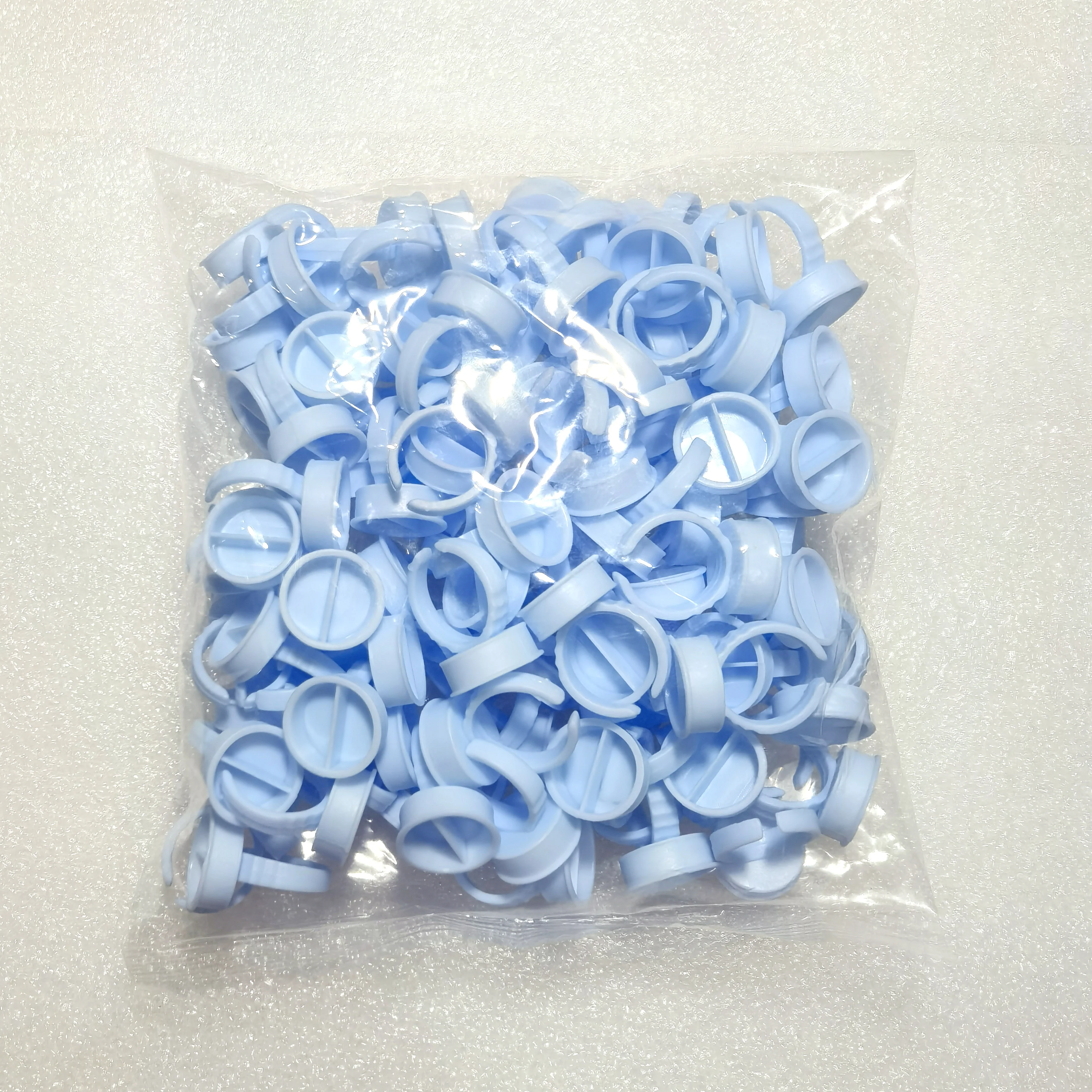

100pcs Disposable Eyelashes Extension Glue Holder Ring Cup Stand Lash Adhesive Glue Tattoo Pigment Container Makeup Tools