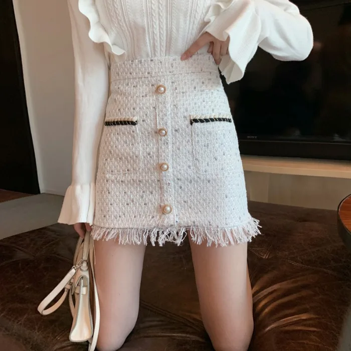 

autumn winter single-breasted tall waist show thin skirts female tassels pockets a word skirt