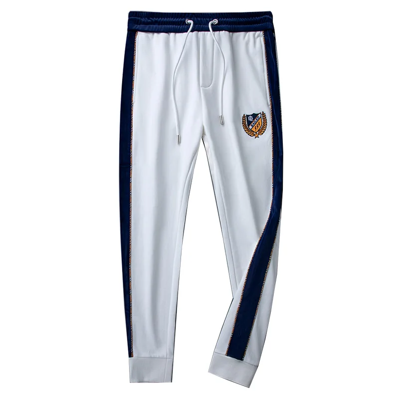 

Light luxury white badge embroidered casual sports pants men's woven foot trousers side webbing trousers