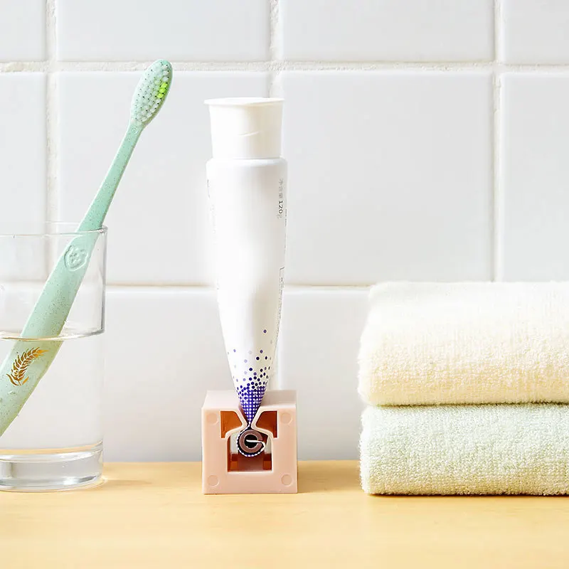 

1PC 4 Colors Home Plastic Toothpaste Tube Squeezer Easy Dispenser Rolling Holder Bathroom Supplies Tooth Cleaning Accessories