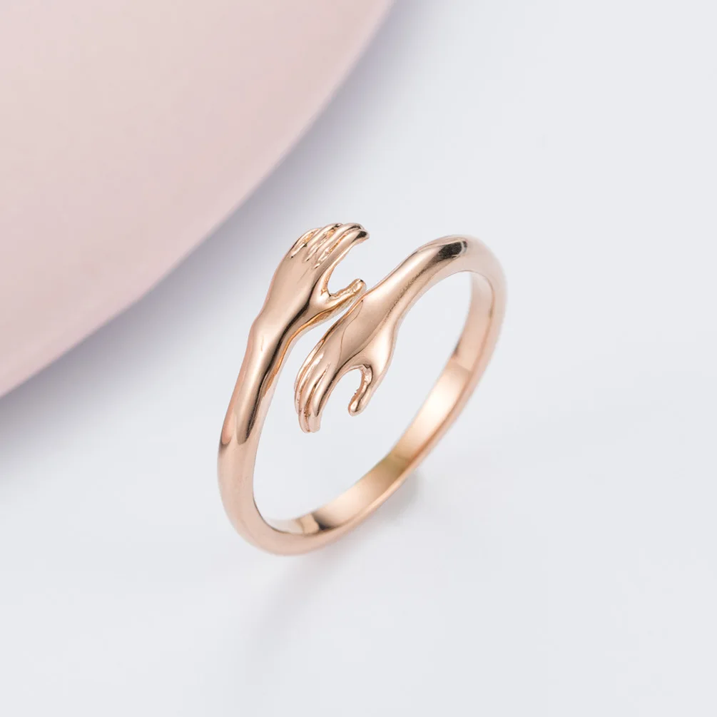 

INSCHIC Hot Sale Romantic Rose Golden Hands Hug Couple Rings For Lover Stainless Steel Women Male Pairs Ring Valentines Day Gift