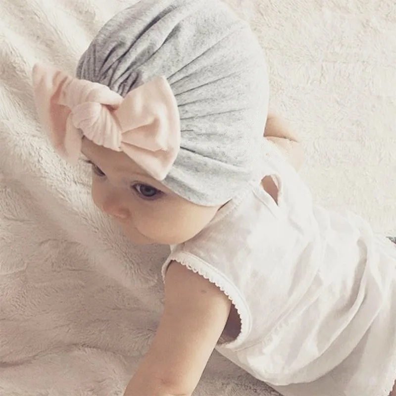 

2019 fabric solid color stitching Indian hat bow baby child hair accessories warm hat baby pom pom hat photography props