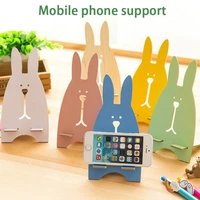 phone stand rabbit mobile phone bracket cute cartoon prison break rabbit wooden mobile phone bracket mobile phone holder