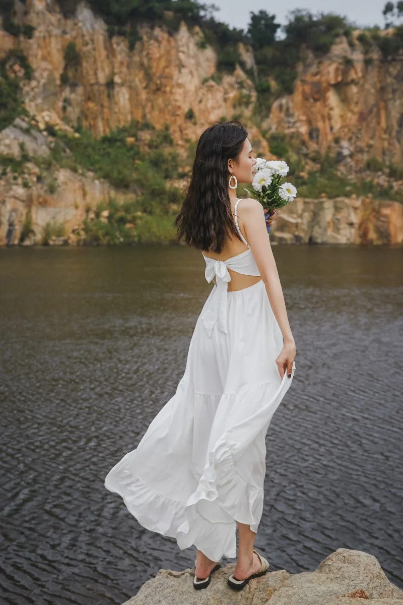 

2021 summer new super fairy sen series French suspender dress seaside vacation travel beach skirt clothes