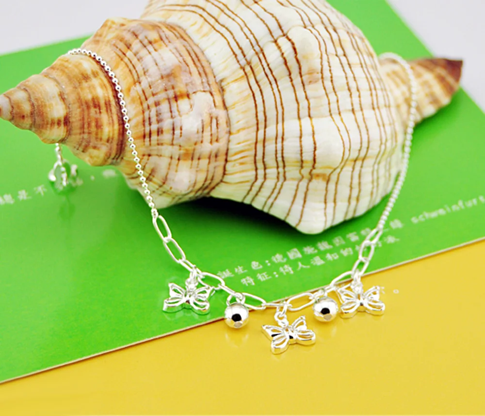 Маленький браслет на ногу с круглыми бусинами и бантом. Браслет из серебра 925