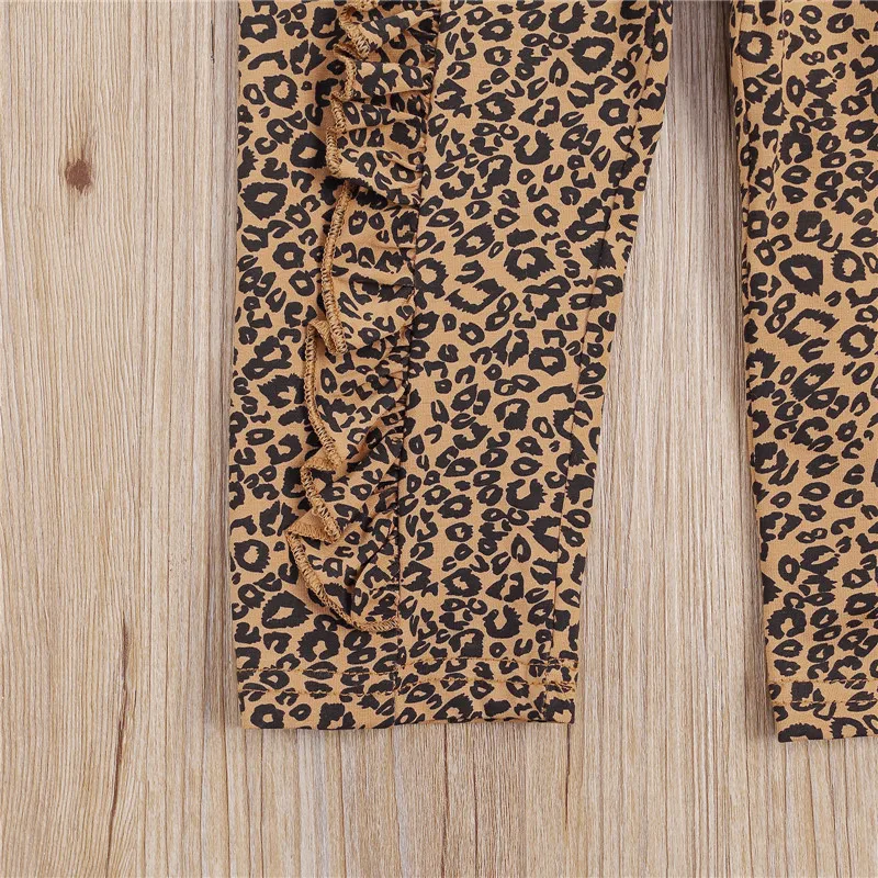 

3pcs Girls Leopard Print Suit Bow Hairband Long Sleeve Round Neck Lotus Lace Top Loose Pants Children's Autumn Clothing
