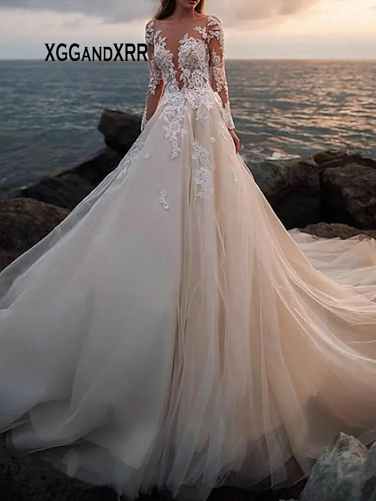 

Elegant A-Line Wedding Dresses Jewel Neck Court Train Lace Tulle Long Sleeves Beach Bridal Gown Sexy See-Through Appliques 2020