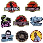 Классическая эмалированная брошь в виде динозавра T-Rex с логотипом Jurassic WORLD