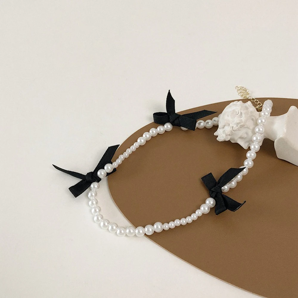 

Korea Sweet Black Bow Necklace Simple Bowknot Plush Pearl Clavicle Chain Collar Ring Bracelet for Women Lady Jewelry