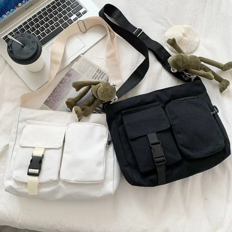 

ins Japanese Harajuku Dark Neutral Women's Women's Tooling Messenger Bag Hong Kong Style Retro Student Canvas Shoulder Class