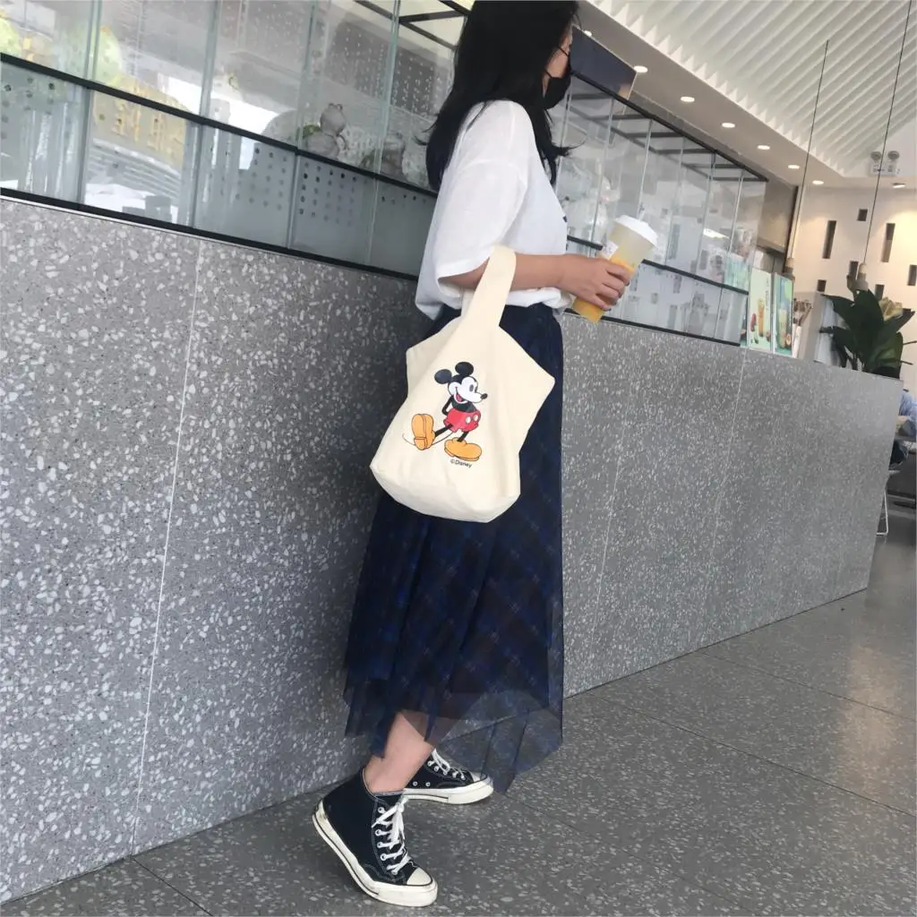 

Disney cartoon Mickey new portable handbag fashion simple student portable canvas bag lady travel shopping storage bag